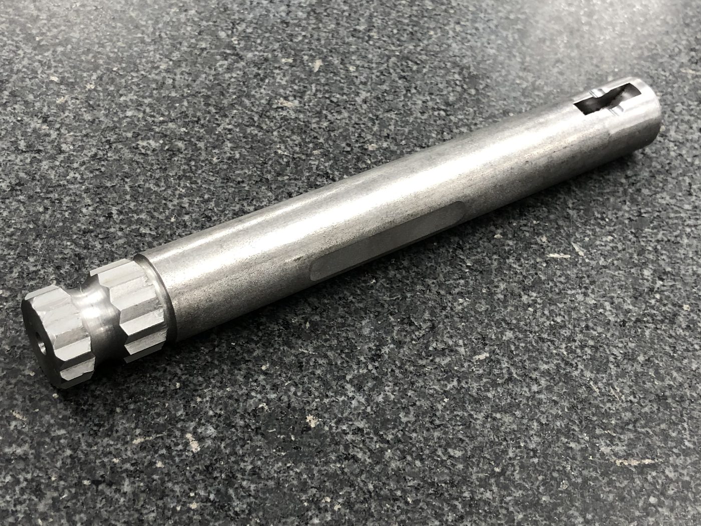 Clutch shaft with external spline and slotted end